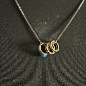 Sterling Silver Ring Pendant Necklace with Turquoise Accent